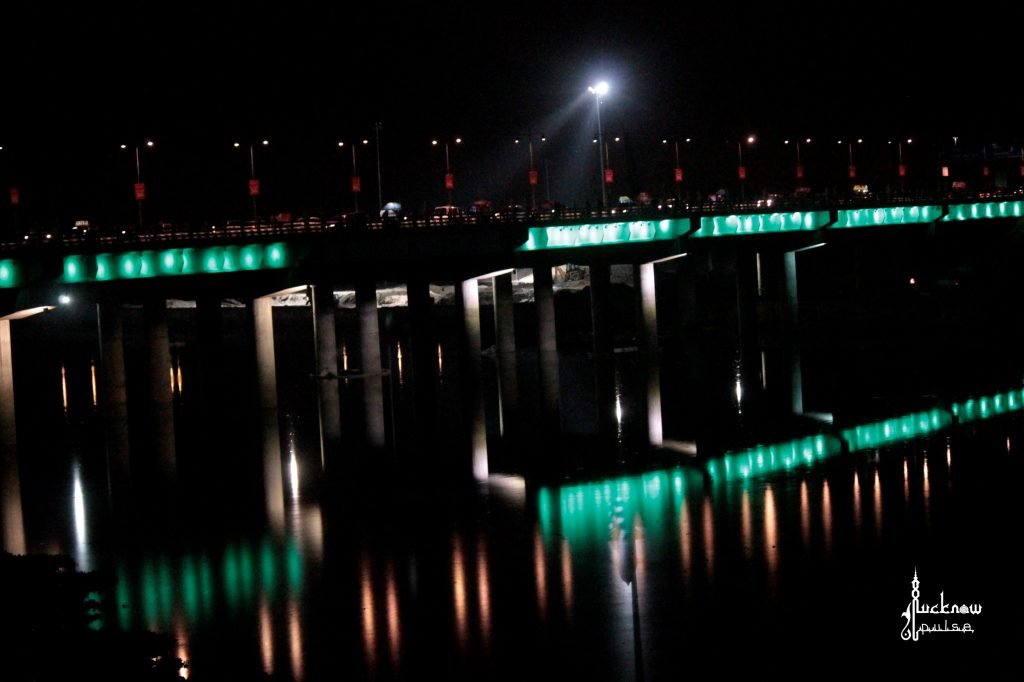 Picture of an illuminated Lohia path bridge on the Gomti river in Lucknow.